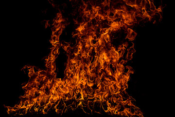 Texture of fire on a black background. Abstract fire flame background, large burning fire.