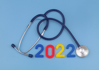 Stethoscope and numbers 2022, medicine and health care in year 2022.