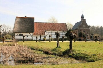 rural landscape with a white farmhouse, Bokrijk, Belgium