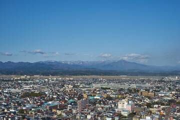Fototapeta na wymiar 秋田県　秋田市土崎と大平山の景色 