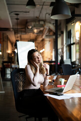 Businesswoman working on laptop. Portrait of beautiful businesswoman in the office.