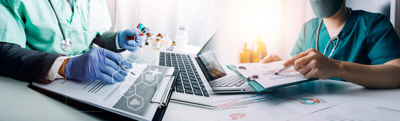 Patient listening intently to a male doctor explaining patient symptoms or asking a question as...