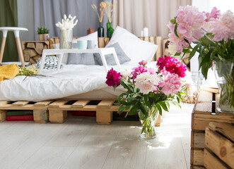 flowers near the bed