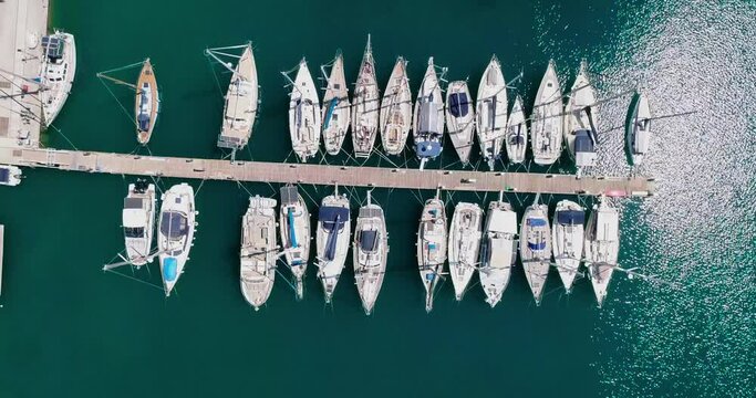 drone shot over the marina, seaside boulevard, beaches, summer in Agios Nikolaos Crete Greece