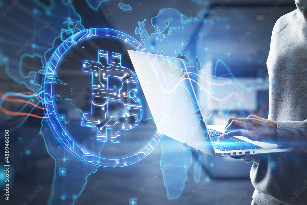 Poster Close up of hacker using laptop computer with creative glowing global bitcoin hologram on blurry office interior background. Hacking, blockchain and crypto concept. Double exposure.