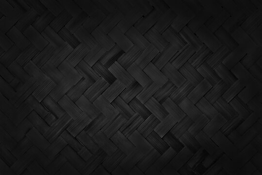 Black weave bamboo pattern, woven rattan mat texture for background and design art work.