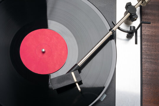 turntable with vinyl record top view, close-up