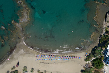 Drone aerial scenery of a sandy bay tropical beach for swimming. Summer vacations