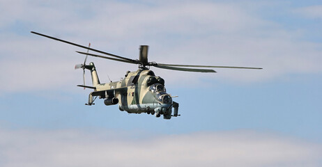Fototapeta na wymiar Russian military helicopter MI-24 during exercises in the Republic of Belarus.