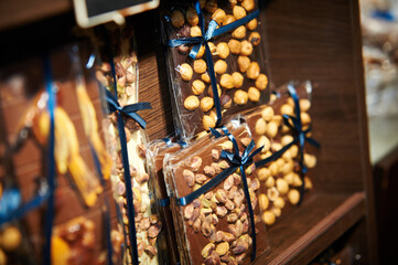 Chocolate peanuts. Assorted Chocolate Bar And Chunks, Background. Flat Lay With Chocolate Variety. Chocolate Collection.