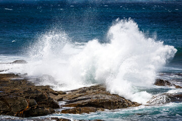 waves crashing on rocks
