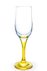 A glass on a yellow stem. Wine glass on a white background.