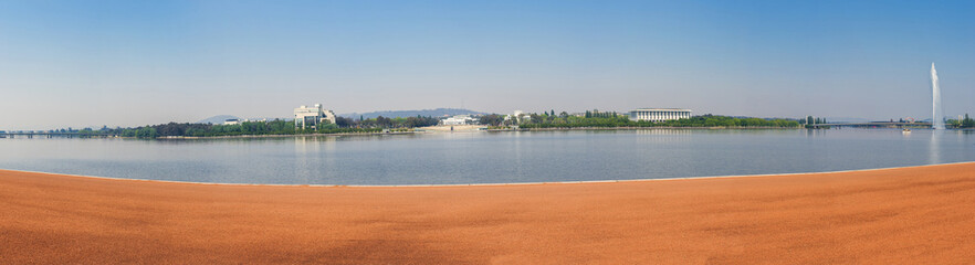 Government buildings and a Burley Griffin Lake in Canberra in Australia - 488956202
