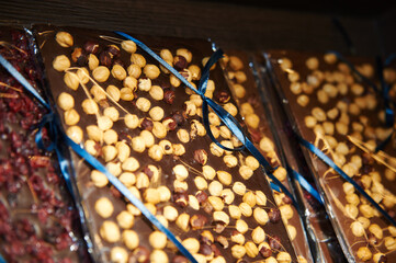 Chocolate peanuts. Assorted Chocolate Bar And Chunks, Background. Flat Lay With Chocolate Variety. Chocolate Collection.