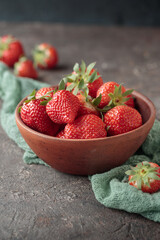 Fresh berries in a wooden bowl