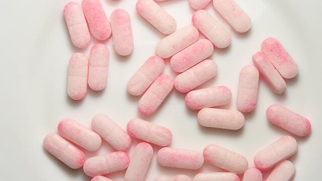 Methylsulfonylmethane tablets in a closeup on a turn table

