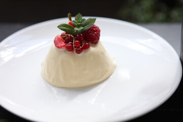 panna cotta with fresh berries and mint