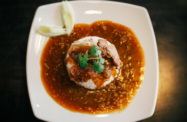 Barbecued red pork in sauce with rice Asian Thai Chinese food