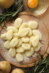 Concept of cooking with raw potato gnocchi, top view