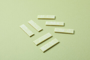 Chewing or bubble gum on green background