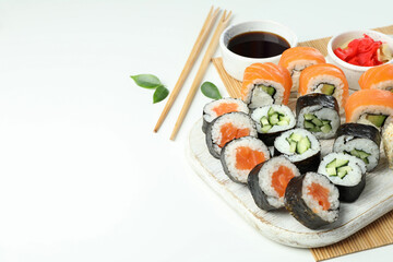 Concept of tasty food with sushi, space for text