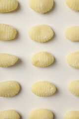Concept of cooking with raw potato gnocchi, close up