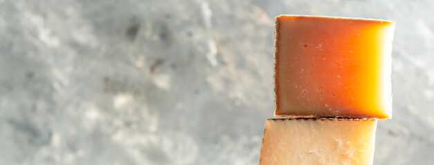 various types of Spanish manchego cheese made from cow and goat milk. International dairy delicacies. Long banner format