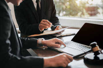 Businessman and Male lawyer or judge consult having team meeting with client, Law and Legal services concept in office.
