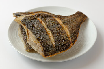 Grilled flounder on a white background