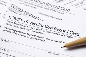 Obraz premium Covid 19 vaccination record card for individual use during the covid 19 coronavirus global pandemic - Image