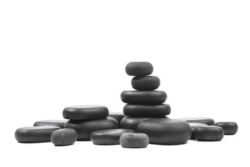 black spa stones isolated on white background .