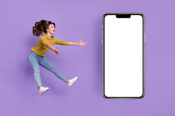 Fototapeta na wymiar Full size profile photo of impressed lady arms catch mobile phone ads isolated purple color background