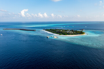 Aerial view, Asia, Indian Ocean, Maldives, Lhaviyani Atoll, Hurawalhi Island resort with beaches and water bungalows