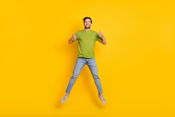 Fototapeta na wymiar Full length photo of young man jumper show fingers thumb-up ad promo suggest approve isolated over yellow color background
