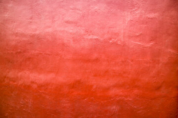 Red textured dirty rough cement concrete background. Grunge wall for pattern and background.