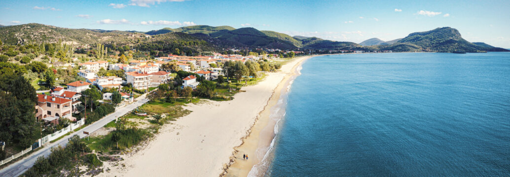 Idyllic aerial view of the sandy Toroni beach on the Sithonia peninsula in the Halkidiki region of Greece. Recreation and tourism concept