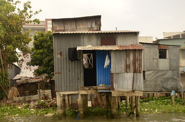 A floating house while sailing the Mekong river delta. Different Vietnam images, streets, markets, rivers.