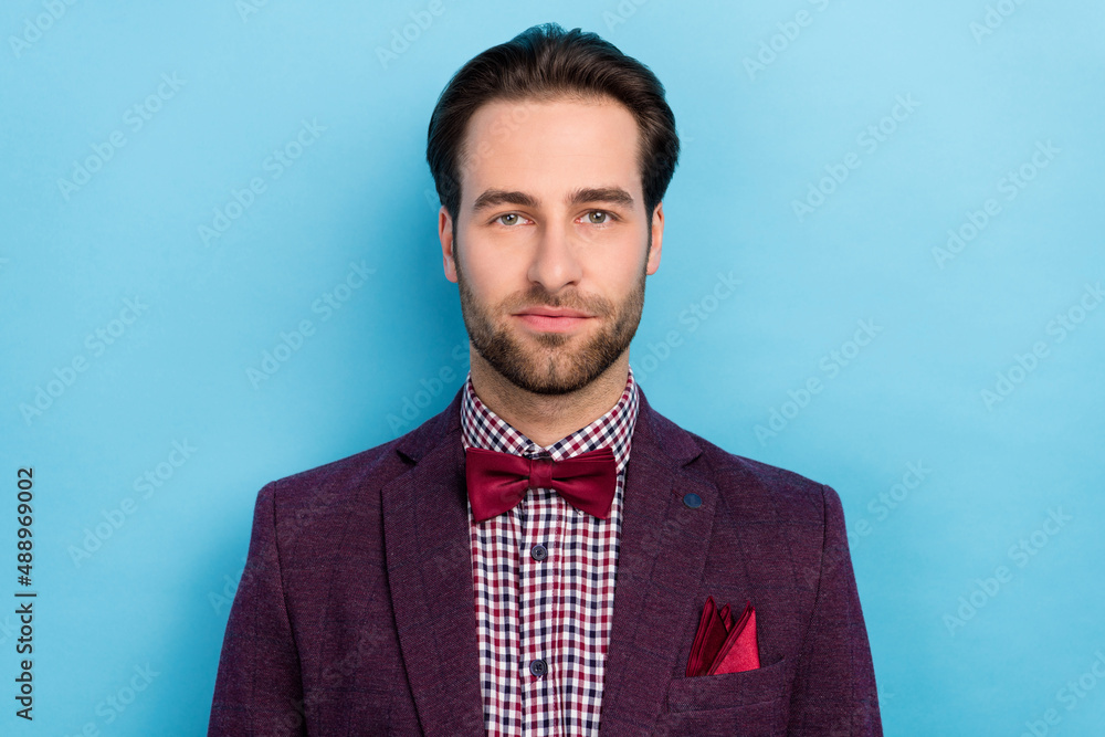 Sticker Portrait of good looking mister man in tuxedo prepare to go to party holiday isolated on blue color background