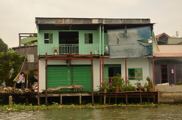 A floating house while sailing the Mekong river delta. Different Vietnam images, streets, markets, rivers.