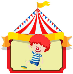 Happy boy with clown nose on circus tent