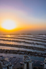Aerial view of the Palm Jumeirah islands during sunset