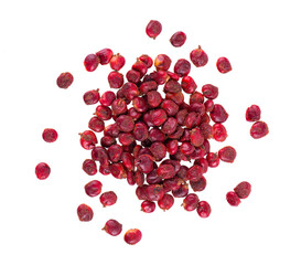 Sumac seeds isolated on white background. Whole dry Rhus berry. Top View.