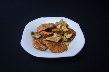 Dried caps of red fly agaric. Treatment with fly agarics