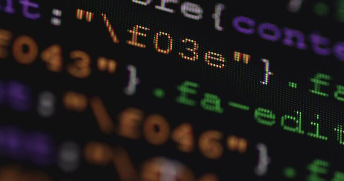 4K Close up shot programming tag code on PC Monitor scroll down. Background concept for programming and coding web development.