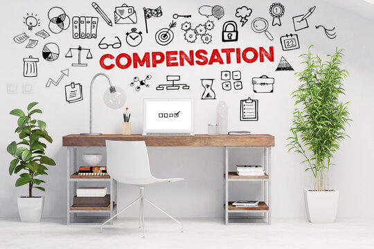 Schriftzug Compensation über Arbeitsplatz