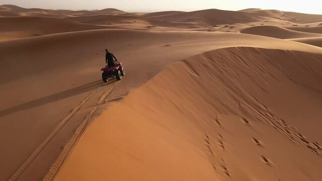 AERIAL: ATV Driving in Sahara Desert