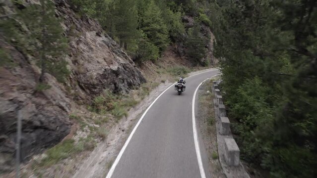 drone video "Follow me", on a trail bike, f800gs, on SH22 road, Albania, video of an adventurous biker traveling alone with the bike loaded with luggage.