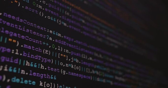 4K Close up shot programming tag code on PC Monitor scroll down. Background concept for programming and coding web development.