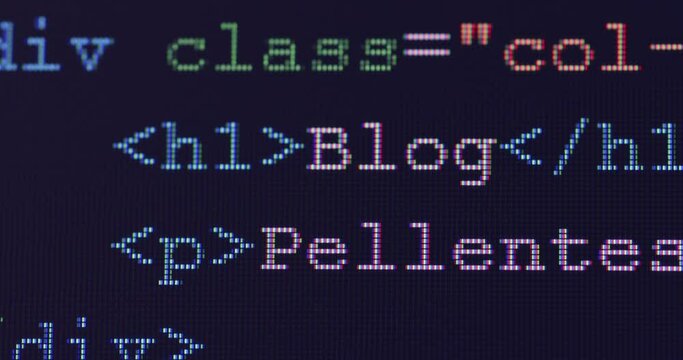 4K Close up shot programming tag code on PC Monitor scroll down. Background concept for programming and coding web development.