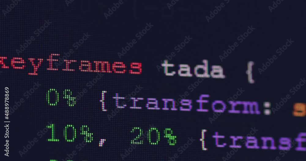 Leinwandbilder 4K Close up shot programming tag code on PC Monitor scroll down. Background concept for programming and coding web development.